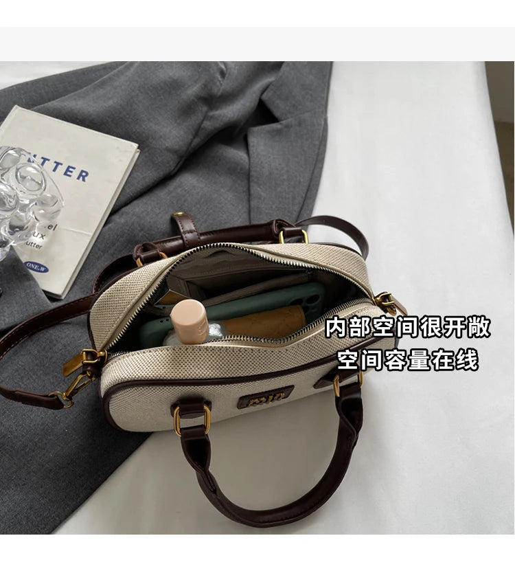 Hand-carrying bowling bag female famous brand 2025 summer new retro fashion shoulder bag high-end trend all-match messenger bag - Youks store